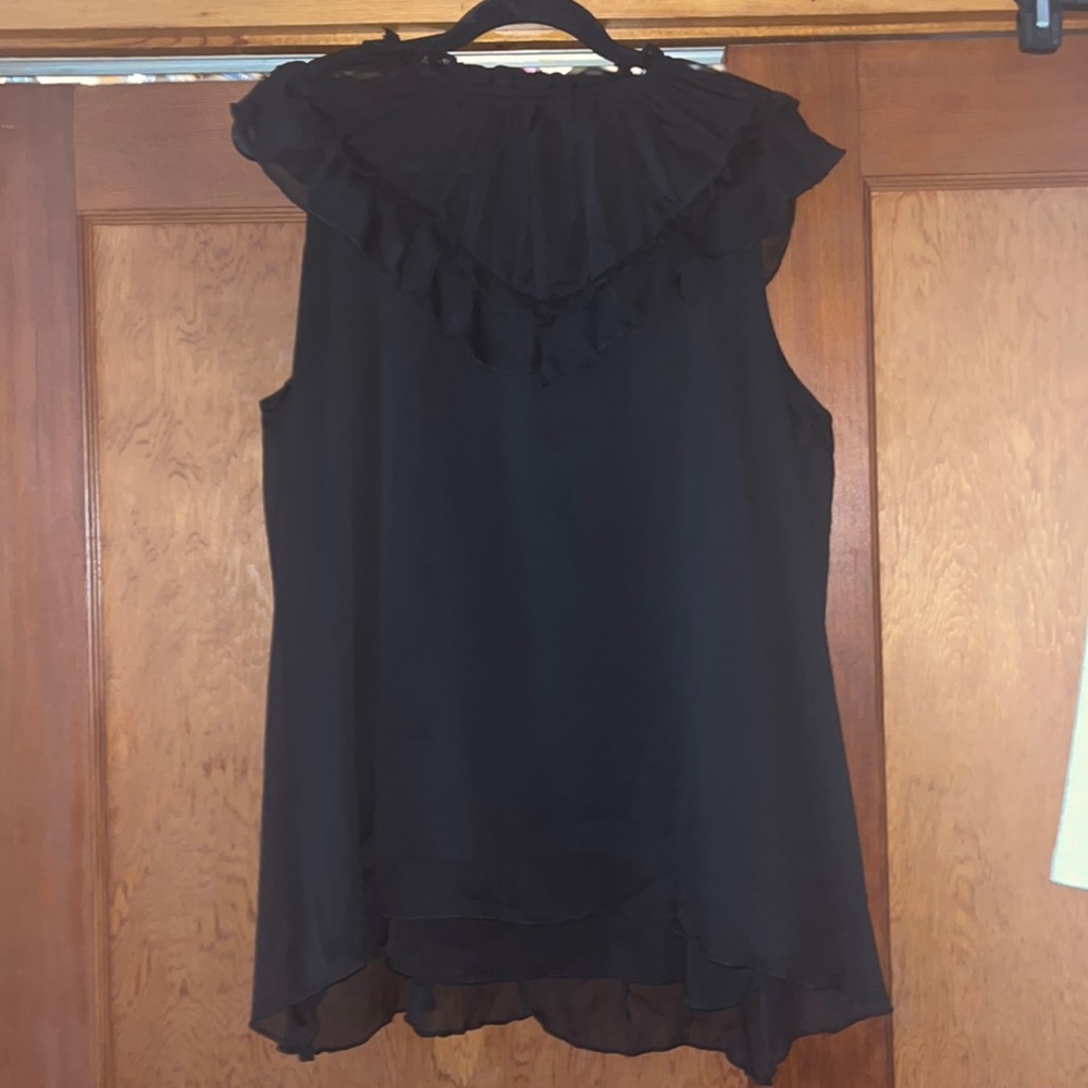 Black top with cap sleeves.
